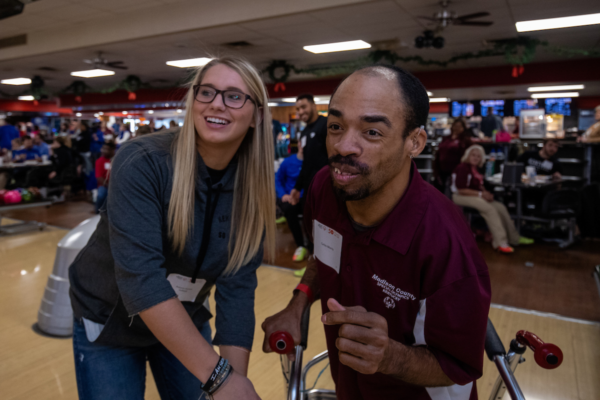 UK athletes bowl with members of Special Olympics at Collins Bowling Alley on , Saturday Dec. 8, 2018  in Lexington, Ky. Photo by Mark Mahan