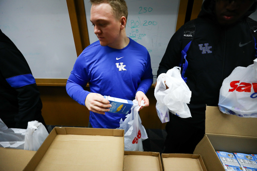 Jackson High.

Kentucky football players pack lunches for God’s Pantry Food Bank.

Photo by Elliott Hess | UK Athletics