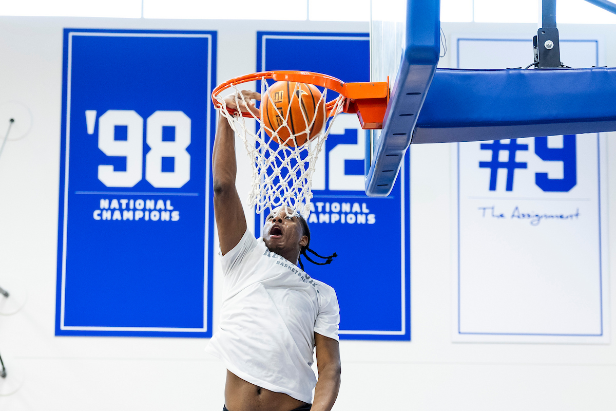 A picture of Justin McBride dunking a basketball