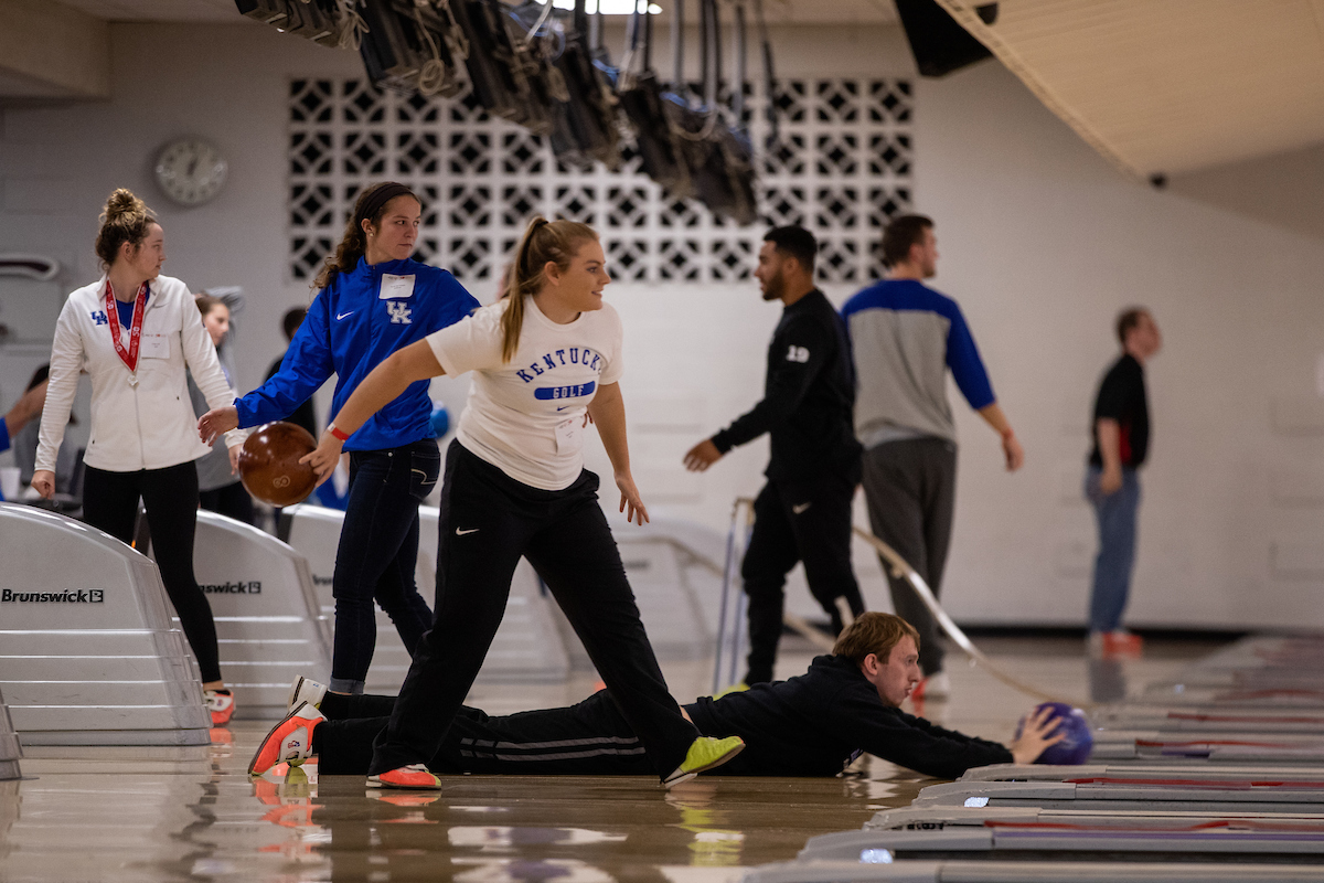 UK athletes bowl with members of Special Olympics at Collins Bowling Alley on , Saturday Dec. 8, 2018  in Lexington, Ky. Photo by Mark Mahan