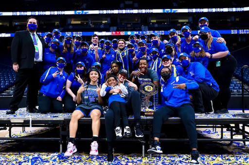 Team. Trophy. Band.

Kentucky beats South Carolina 64-62 and becomes SEC Champions.

Photo by Eddie Justice | UK Athletics