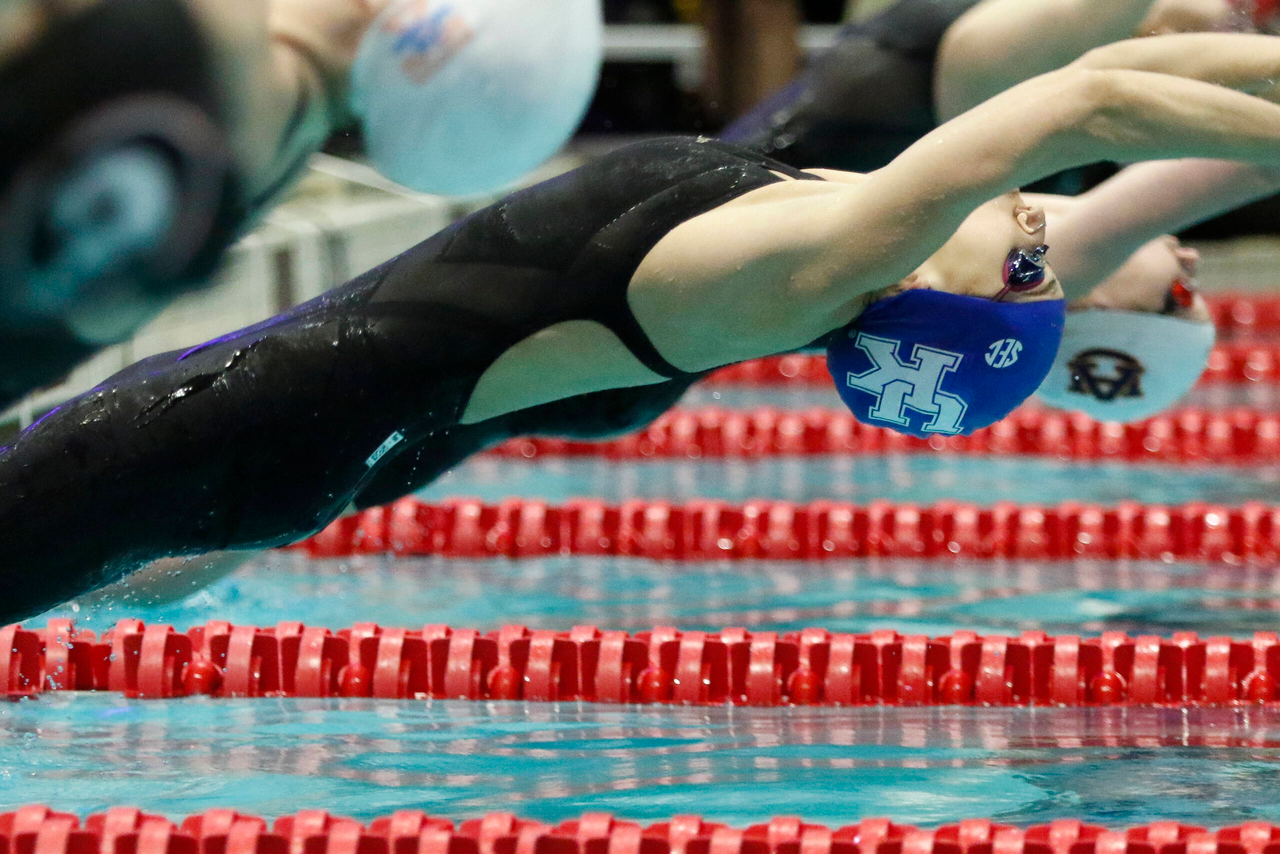 Asia Seidt dives into the pool at the start of the women's 200 yard backstroke during the final day of the 2019 SEC Swimming and Diving Championships in the Gabrielsen Natatorium at the University of Georgia in Athens, Ga., on Saturday, Feb. 23, 2019. (Casey Sykes)