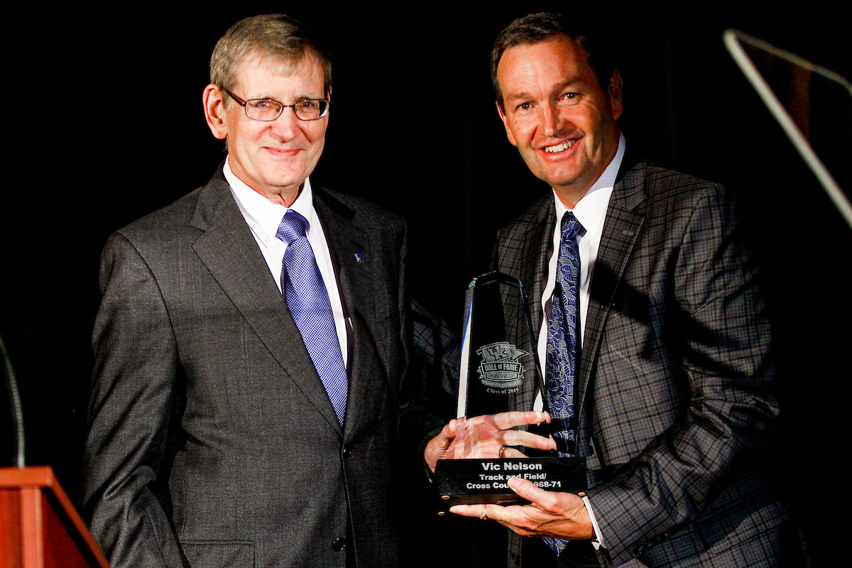 Vic Nelson. Mitch Barnhart. 

UK Athletics Hall of Fame. 

Photo by Eddie Justice | UK Athletics