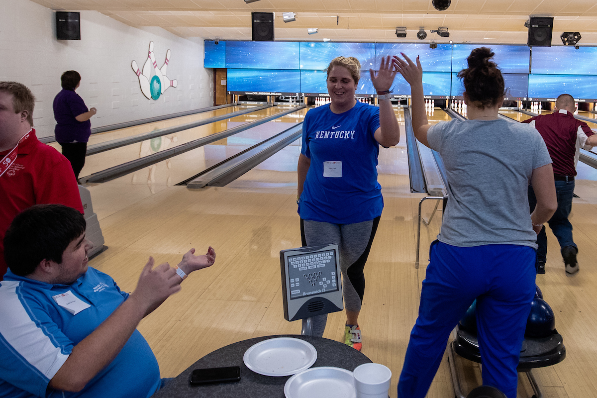 UK athletes bowl with members of Special Olympics at Collins Bowling Alley on , Saturday Dec. 8, 2018  in Lexington, Ky. Photo by Mark Mahan