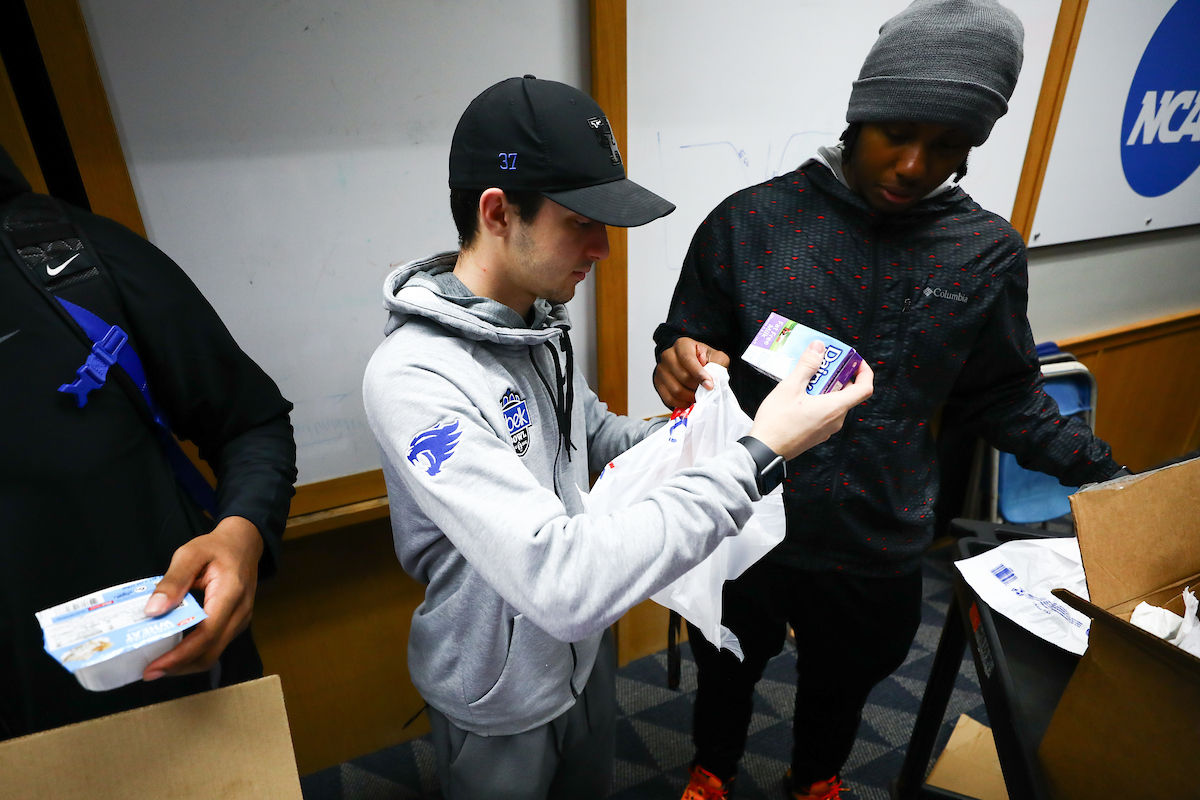 Tyler Beisner.

Kentucky football players pack lunches for God’s Pantry Food Bank.

Photo by Elliott Hess | UK Athletics