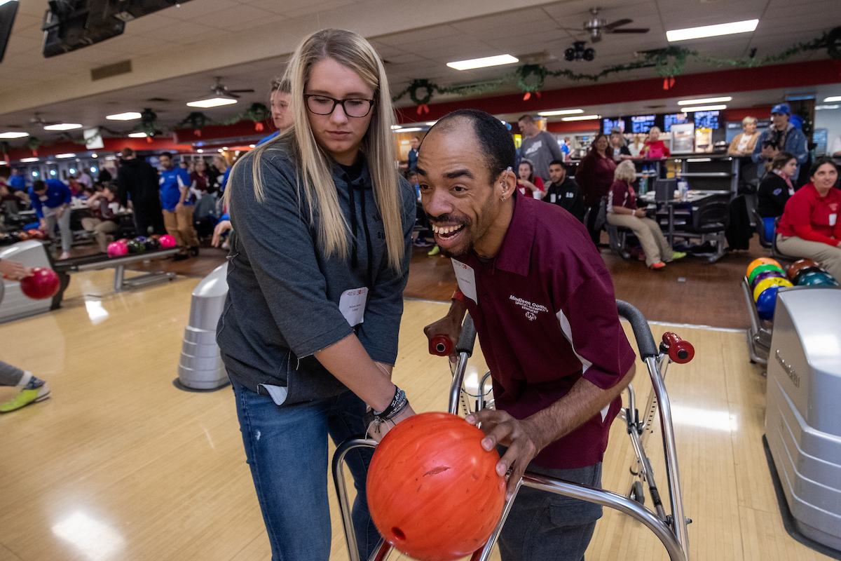 UK athletes bowl with members of Special Olympics at Collins Bowling Alley on , Saturday Dec. 8, 2018  in Lexington, Ky. Photo by Mark Mahan
