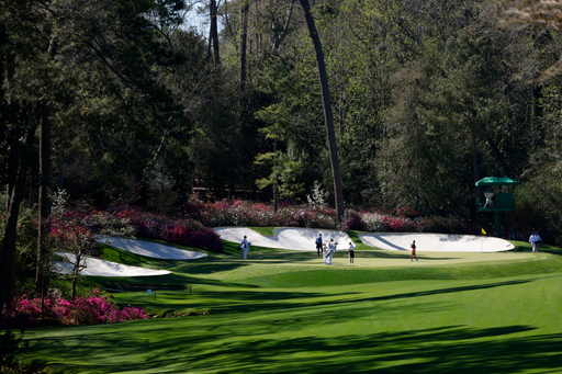 Latanna Stone of the United States, Aline Krauter of Germany and Jensen Castle of the United States play the No. 13 green during a practice round for the Augusta National Women's Amateur at Augusta National Golf Club, Friday, April 1, 2022.