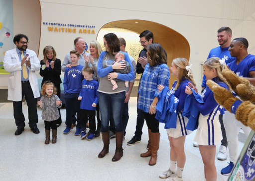 Sarah Howard and her family are presented with a vacation trip to the 2019 VRBO Citrus Bowl to cheer on the Kentucky Wildcats.

Photo by Noah J. Richter | UK Athletics
