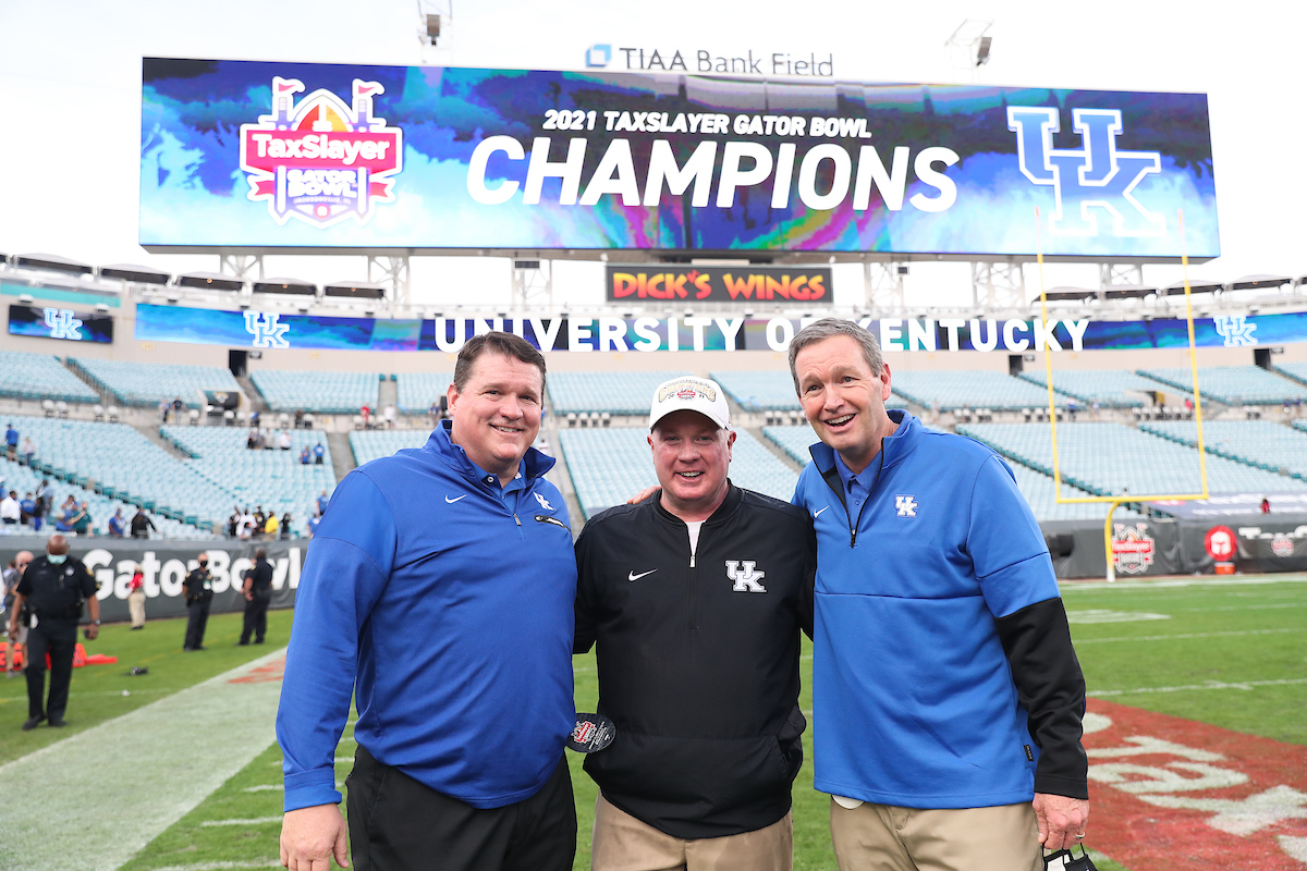 COACH MARK STOOPS. MARC HILL. MITCH BARNHART.

Kentucky beats NC State, 23-21, to win the TaxSlayer Gator Bowl.

Photo by Elliott Hess | UK Athletics