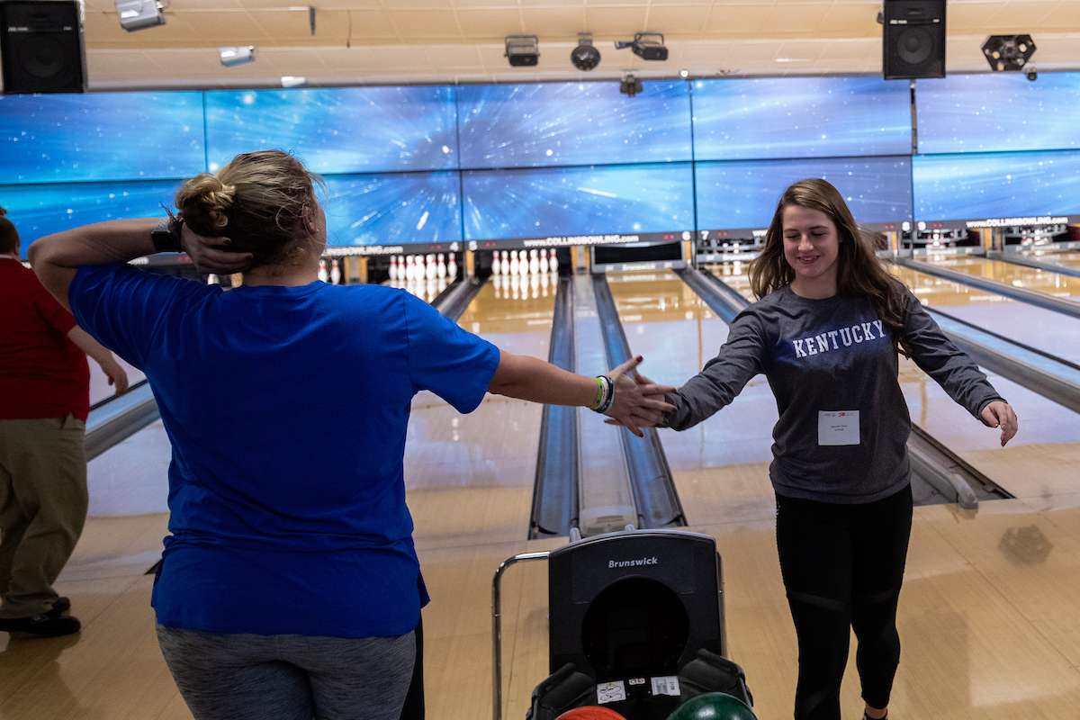 UK athletes bowl with members of Special Olympics at Collins Bowling Alley on , Saturday Dec. 8, 2018  in Lexington, Ky. Photo by Mark Mahan