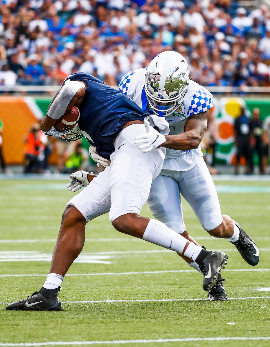 Defense.

The UK football team beat Penn State27-24 in the Citrus Bowl.

Photo by Chet White | UK Athletics