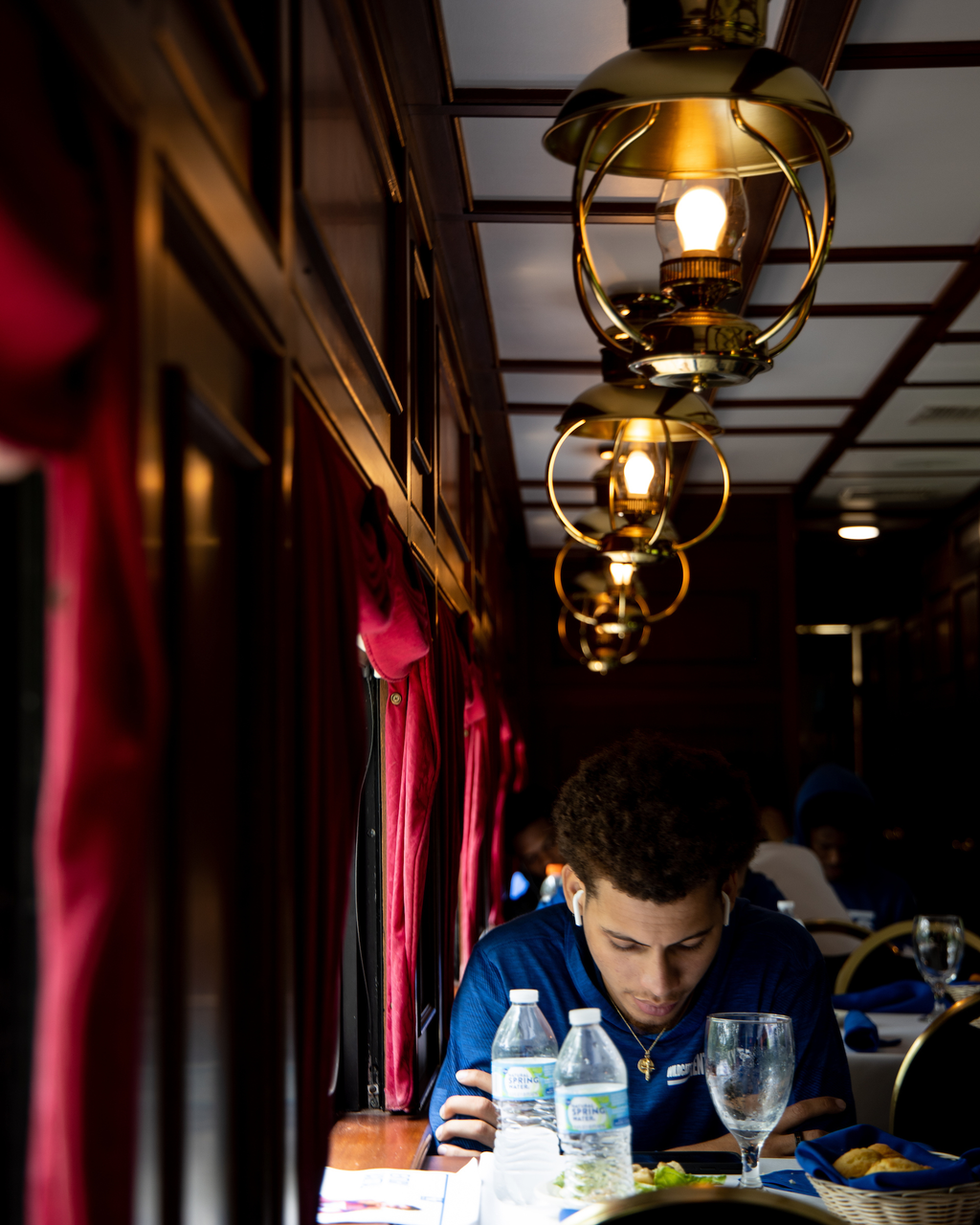 Kellan Grady. 

The Kentucky men's basketball team rode an RJ Corman train to the satellite camp at South Oldham High School in Crestwood, Kentucky.

Photo by Eddie Justice | UK Athletics