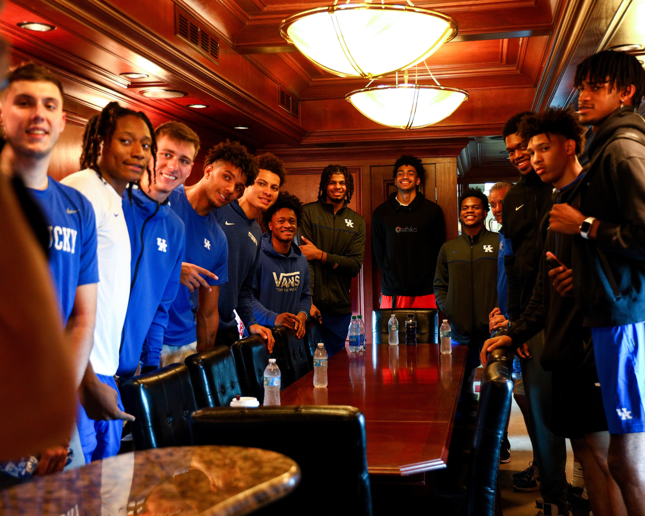 Team. CJ Fredrick. TyTy Washington. Brennan Canada. Dontaie Allen. Kellan Grady. Kareem Watkins. Bryce Hopkins. Jacob Toppin. Sahvir Wheeler. John Calipari. Keion Brooks Jr. Zan Payne. Daimion Collins.

The Kentucky men's basketball team rode an RJ Corman train to the satellite camp at South Oldham High School in Crestwood, Kentucky.

Photo by Eddie Justice | UK Athletics