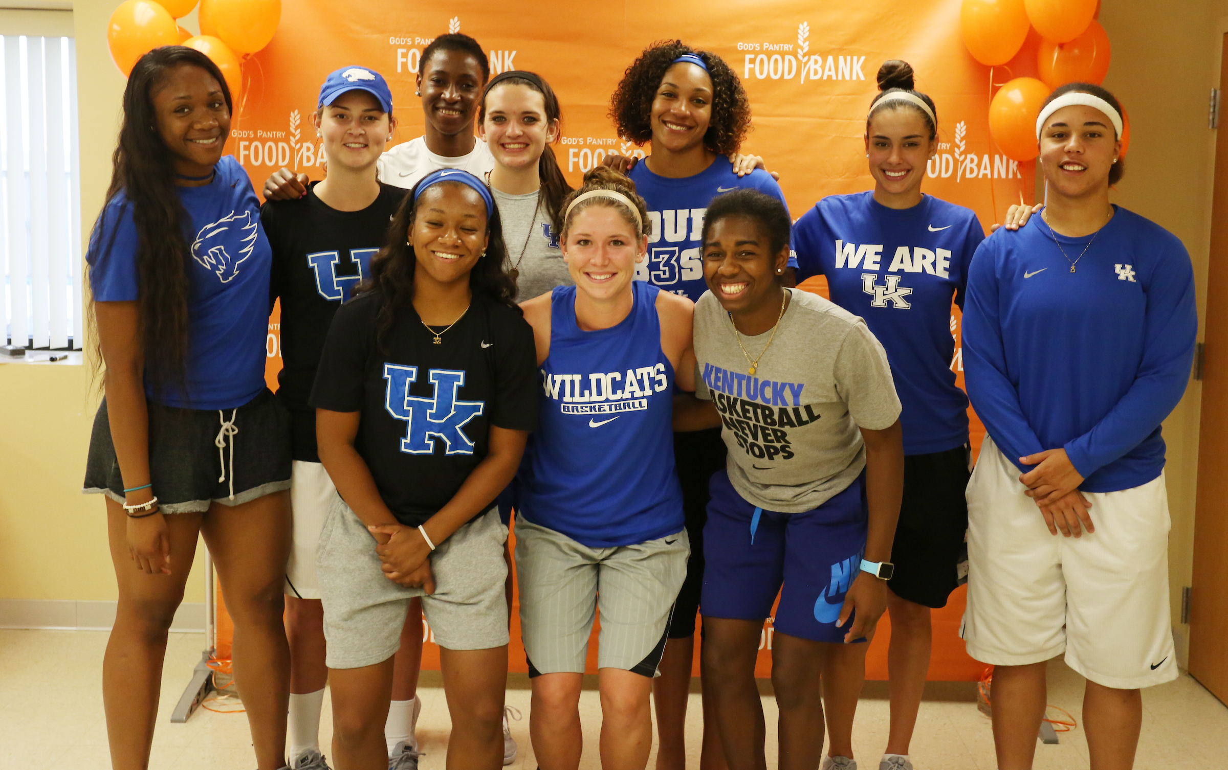 Women's Basketball Volunteers at God's Pantry Food Bank in Lexington