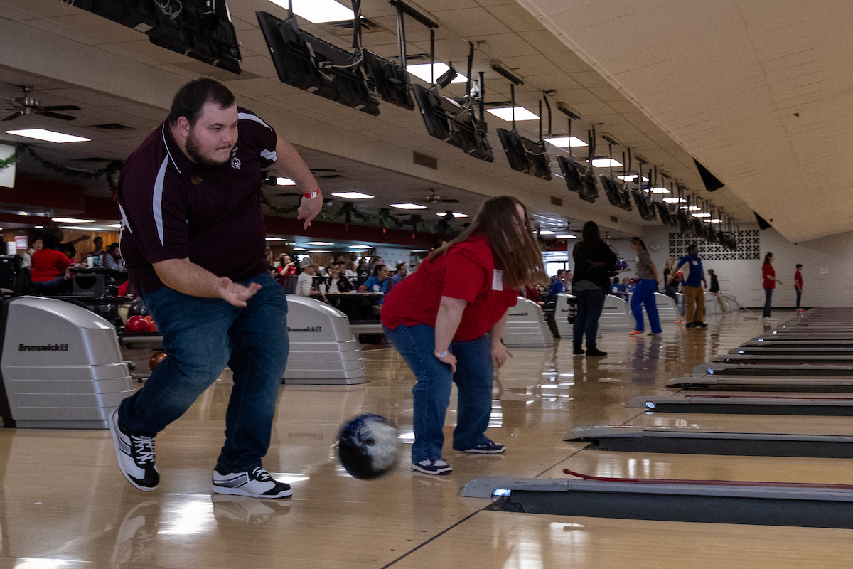 UK athletes bowl with members of Special Olympics at Collins Bowling Alley on , Saturday Dec. 8, 2018  in Lexington, Ky. Photo by Mark Mahan