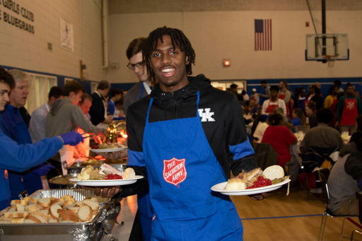 The Kentucky men's basketball team served food at the Salvation Army on Thanksgiving. 